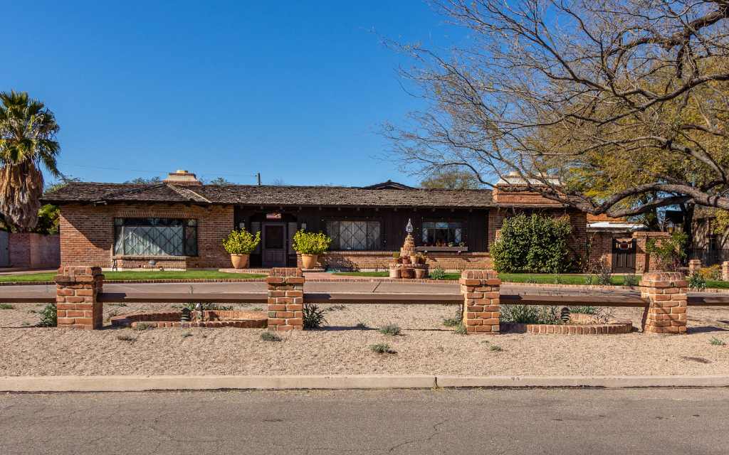 Burnt adobe ranch style home in Catalina Vista historic district in Tucson