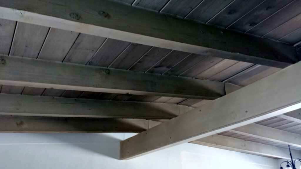Many Lusk built houses feature exposed wood beam ceilings