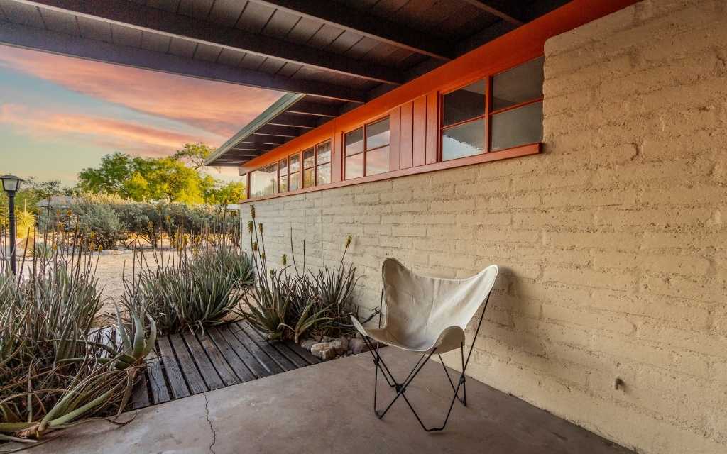 This midcentury modern home in midtown Tucson features ribbon windows on several elevations. 