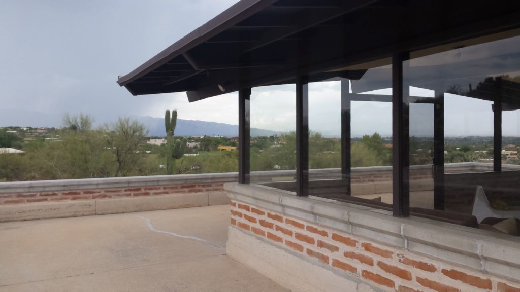 Burnt adobe home with a mountain view