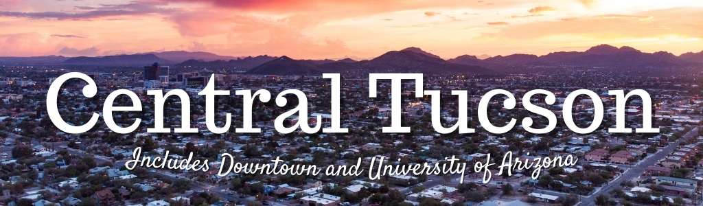 Aerial view of central Tucson street grid at sunset with Tucson Mountains in background