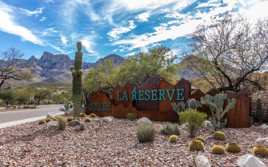 La Reserve sign in Oro Valley off of Oracle Road with Pusch Ridge in the background