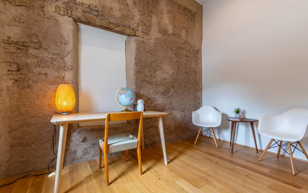 This spare bedroom in a historic mud adobe home was staged as an office space.
