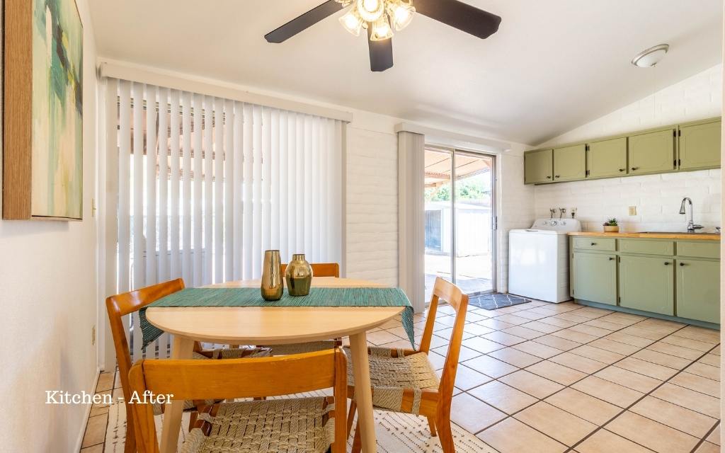 kitchen, after staging with dining table and chairs.