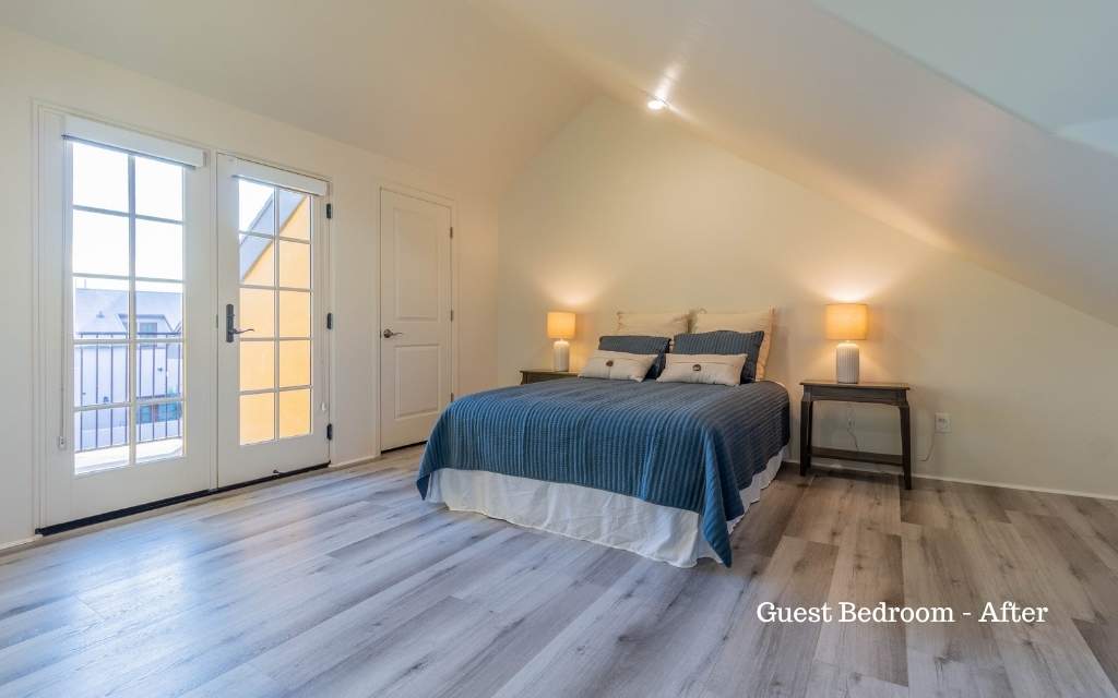 A guest bedroom has been minimally staged to help a buyer visualize the space.