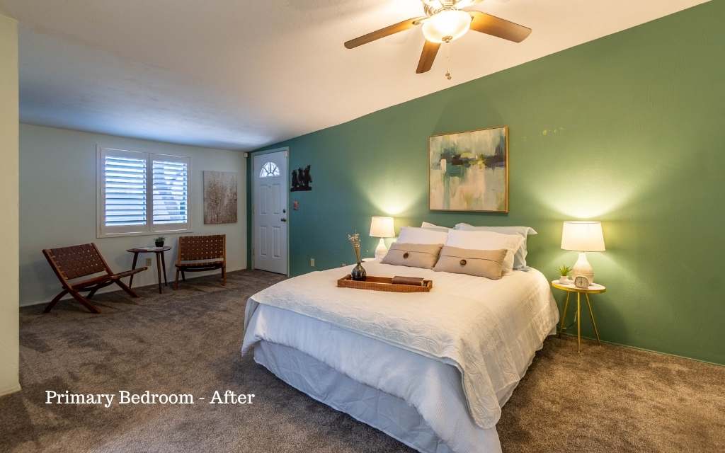 Staging this primary bedroom shows off the spaciousness of the bedroom.